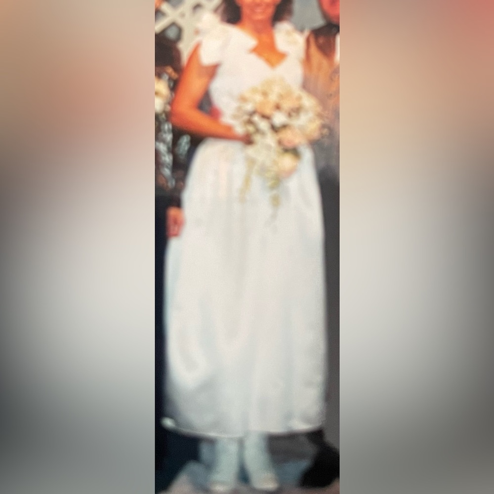 Wedding dress, worn once than dry cleaned and stored in tight sealed box